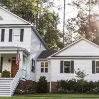 White house with a beautiful yard